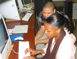 Staff member Ismael Torres mentors a beginning apprentice in fall 2006.