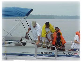 Mr. Fuerst and students taking sample