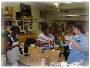 Students and TA assembling rockets